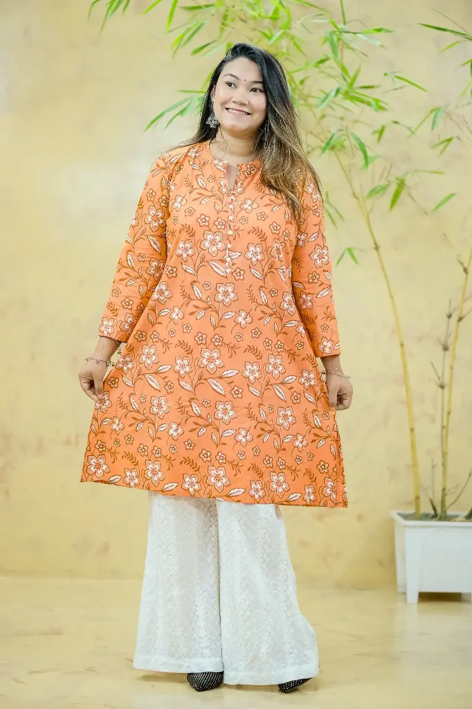 Peach Body Brown Floral Short Kurti