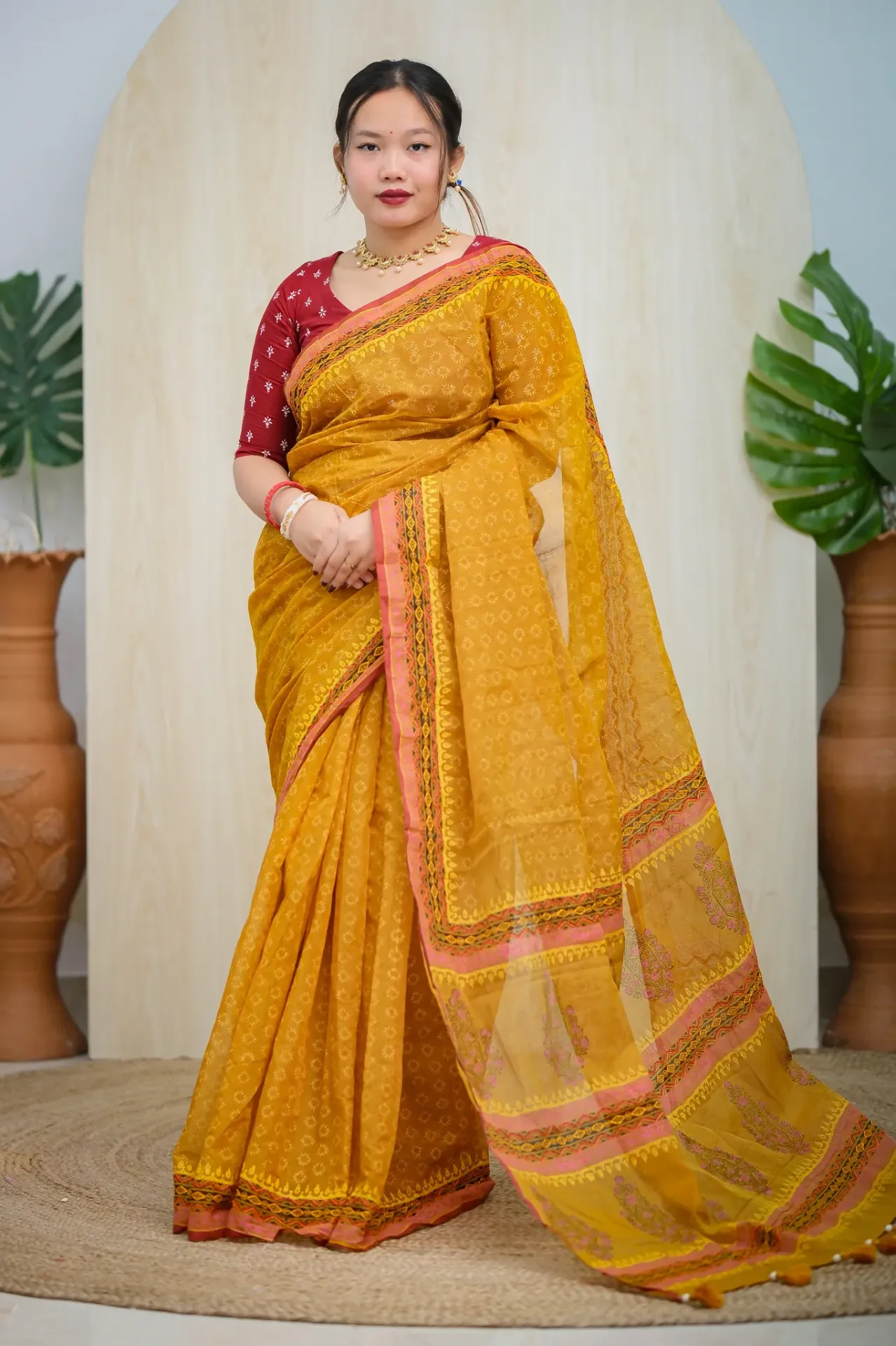 Mustard Yellow Body Pink Floral Hand Work Sharee